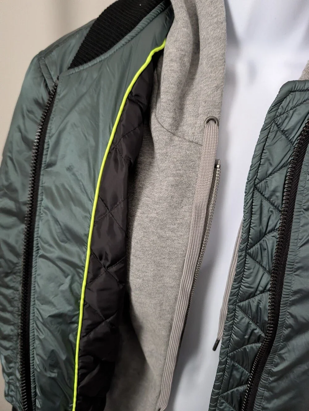 Men's Quilted Bomber Jacket in Deep Green with Grey Hoodie Layer